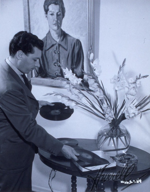 George Hurrell playing a record